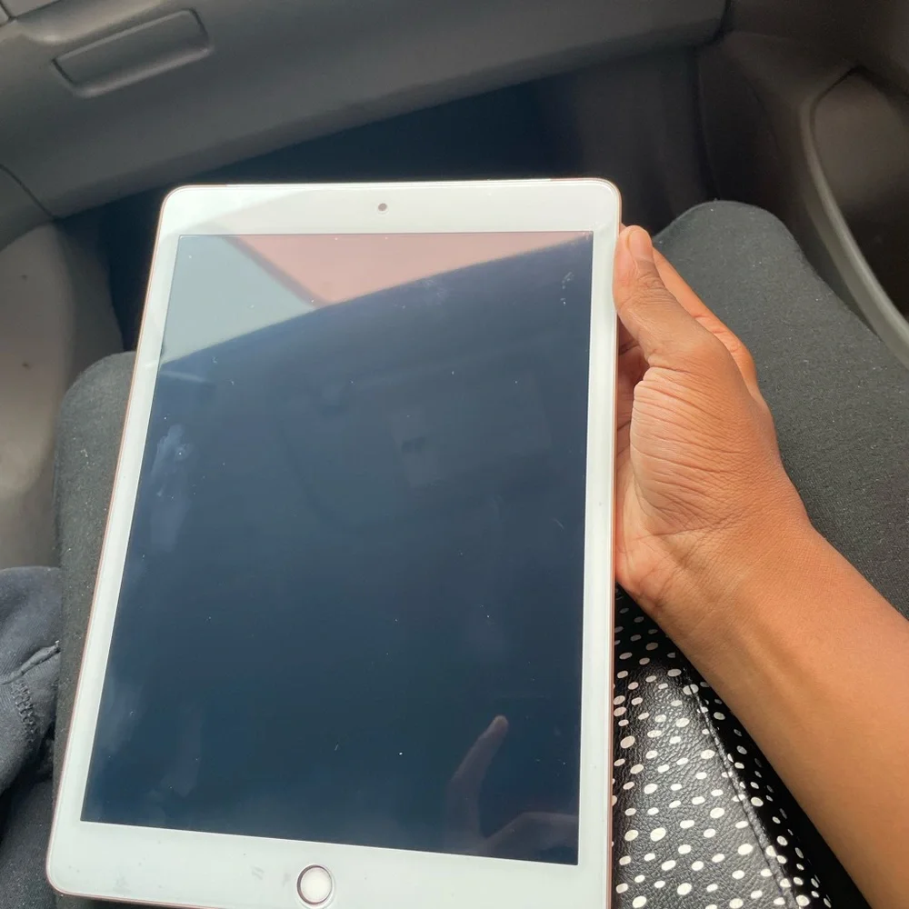 Apple Tablet with White and Silver Design